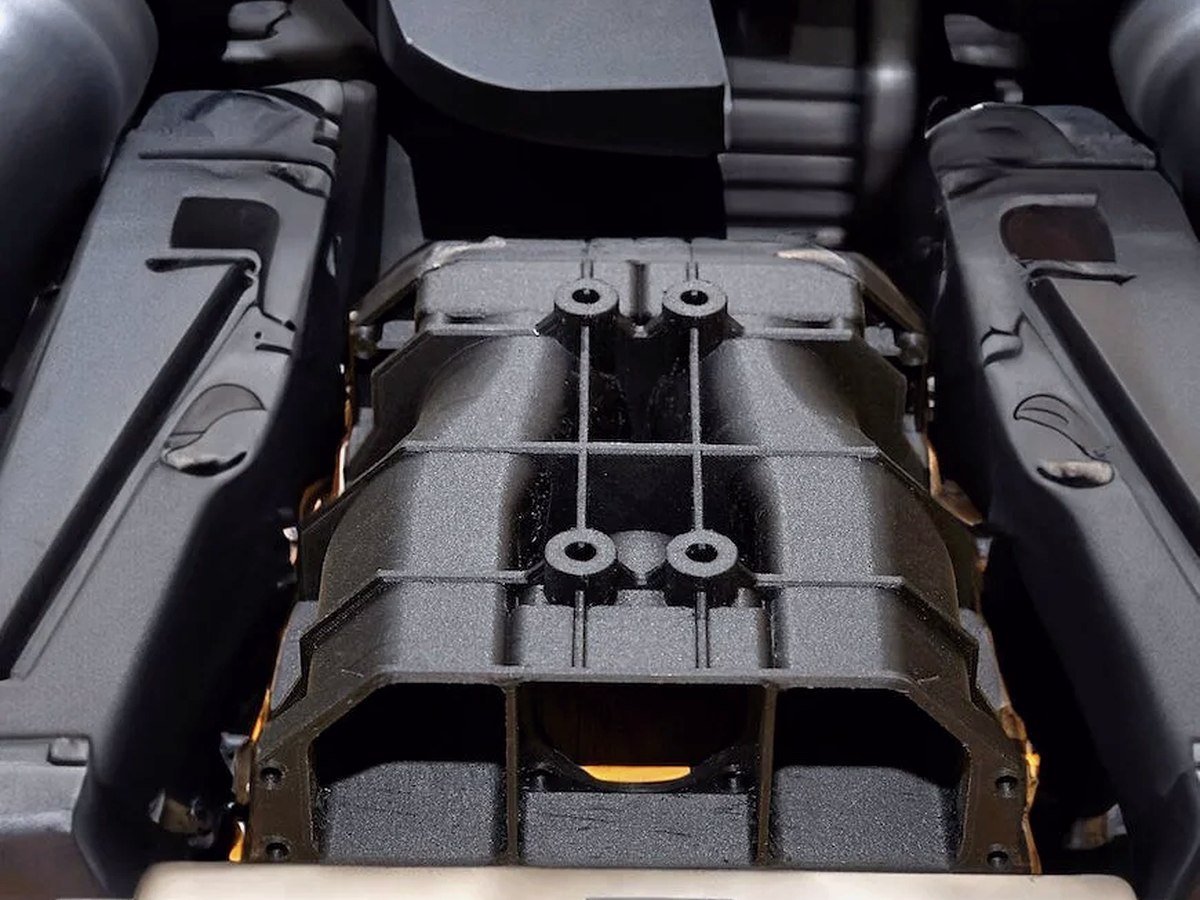 A printed intake manifold in an engine bay