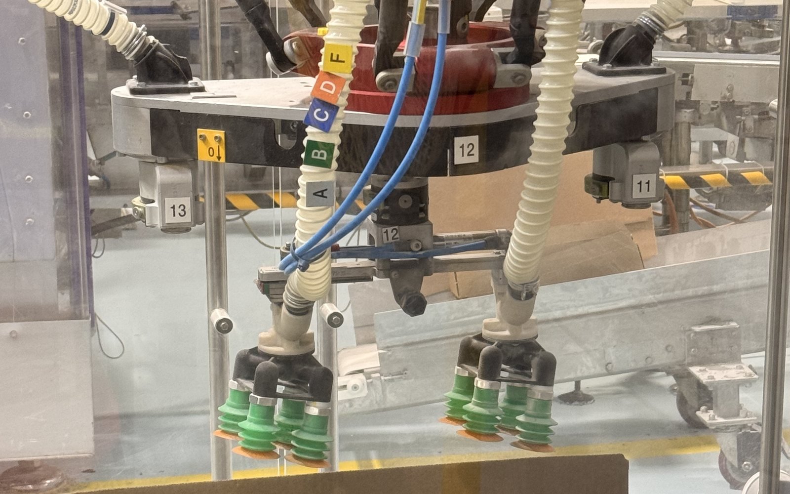 Replacement vacuum fittings running on the pick-and-place head of a production line